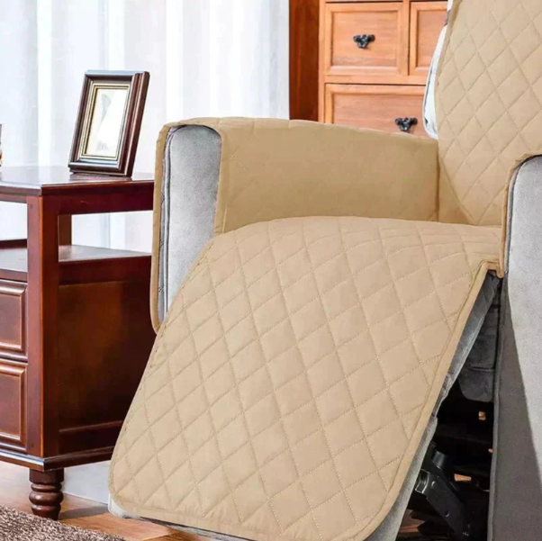 Universal fit quilted recliner cover in grey, protects furniture from spills & pets.