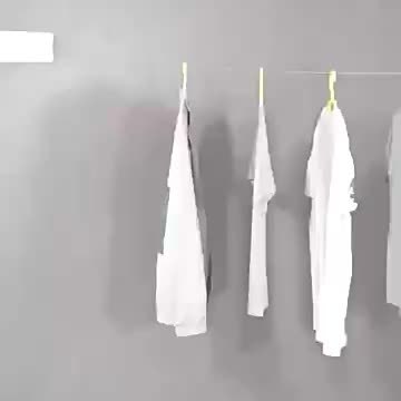 Compact foldable double clothesline for indoor/outdoor laundry drying. Stainless steel, space-saving rack.