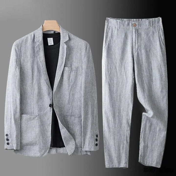 Grey lightweight men's two-piece suit, offering all-day comfort and versatile styling for formal or casual events.