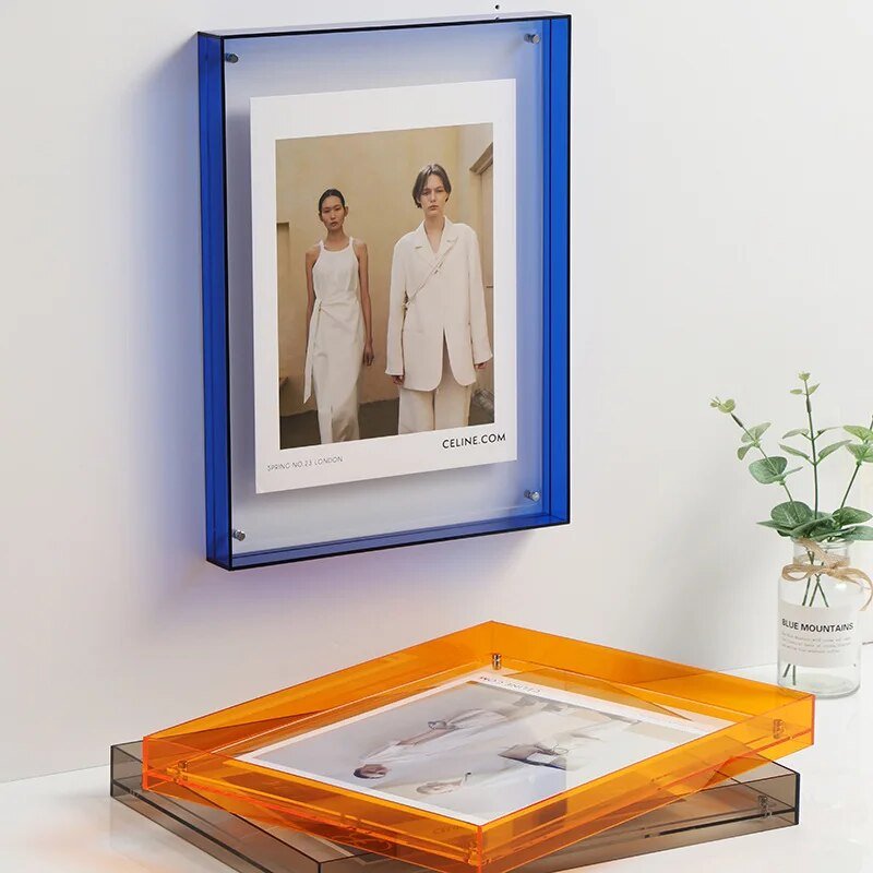 Vibrant acrylic picture frame for modern home decor, displaying photos on tabletop or wall.