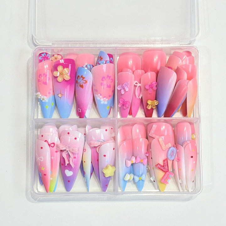Expressive women's press-on nails. Artistic nail art with diverse designs for a vibrant, easy-to-apply false manicure.
