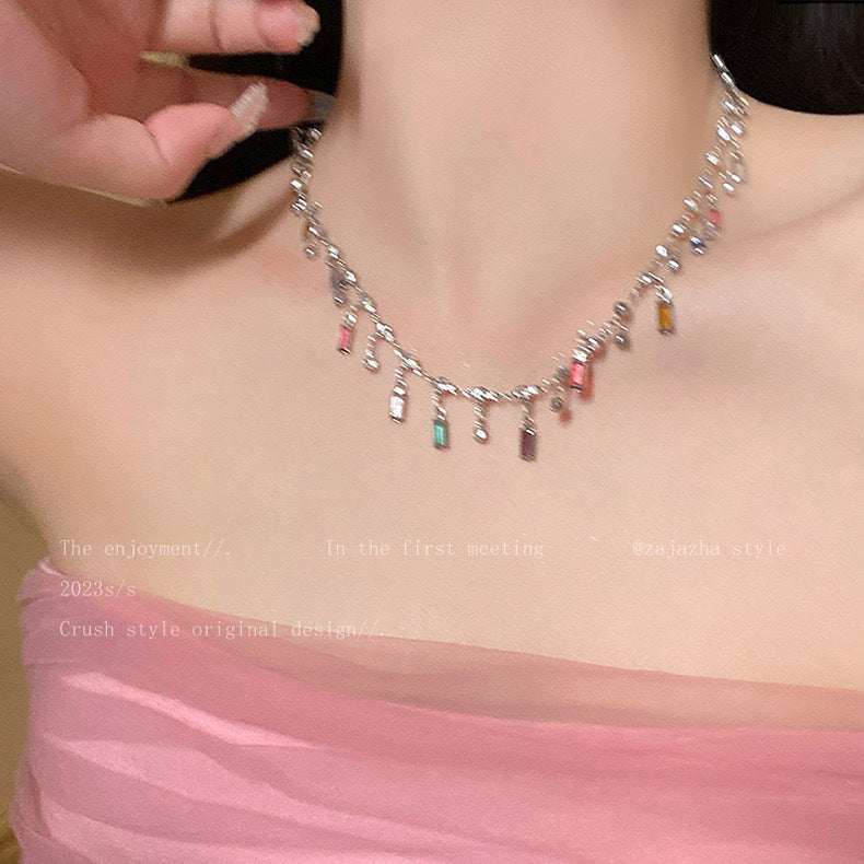 Colorful Statement Necklace, elegant women's jewelry with various charms, a vibrant fashion accessory.