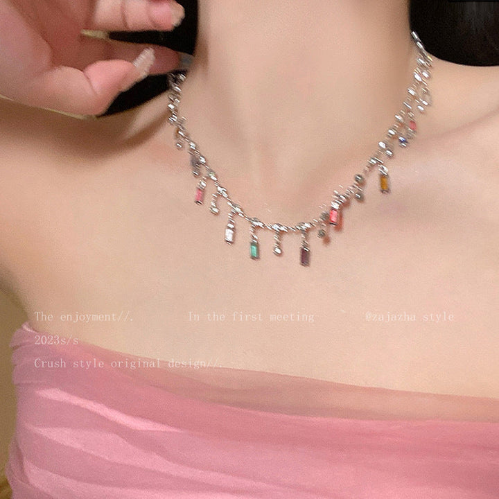 Colorful Statement Necklace, elegant women's jewelry with various charms, a vibrant fashion accessory.