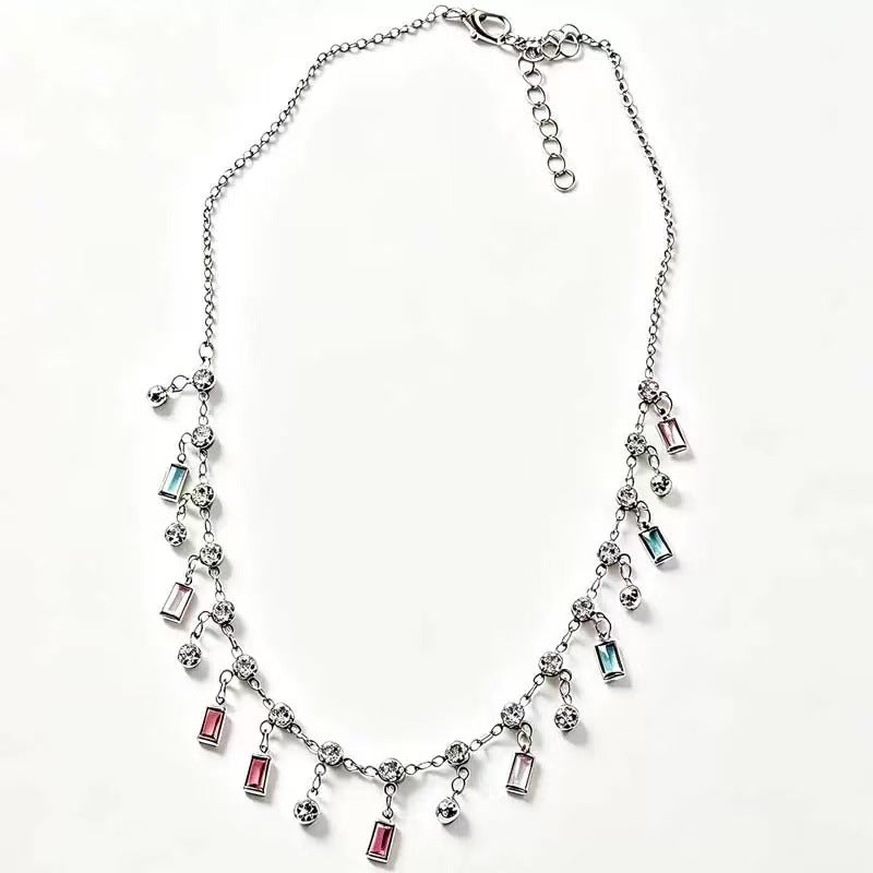 Elegant & Playful Statement Necklace, showcasing vibrant charms for a unique women's fashion accessory.