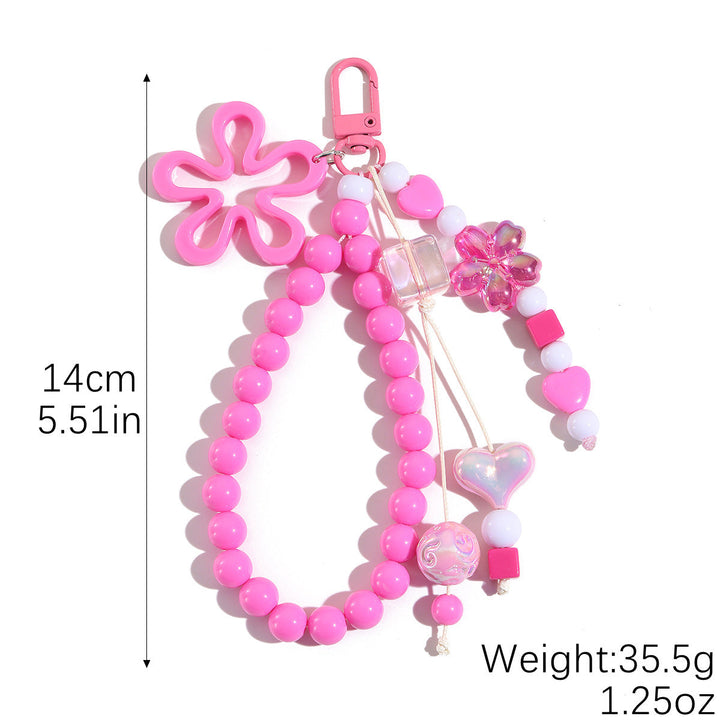 Unique floral butterfly key fob, a colorful and decorative accessory for women's bags.