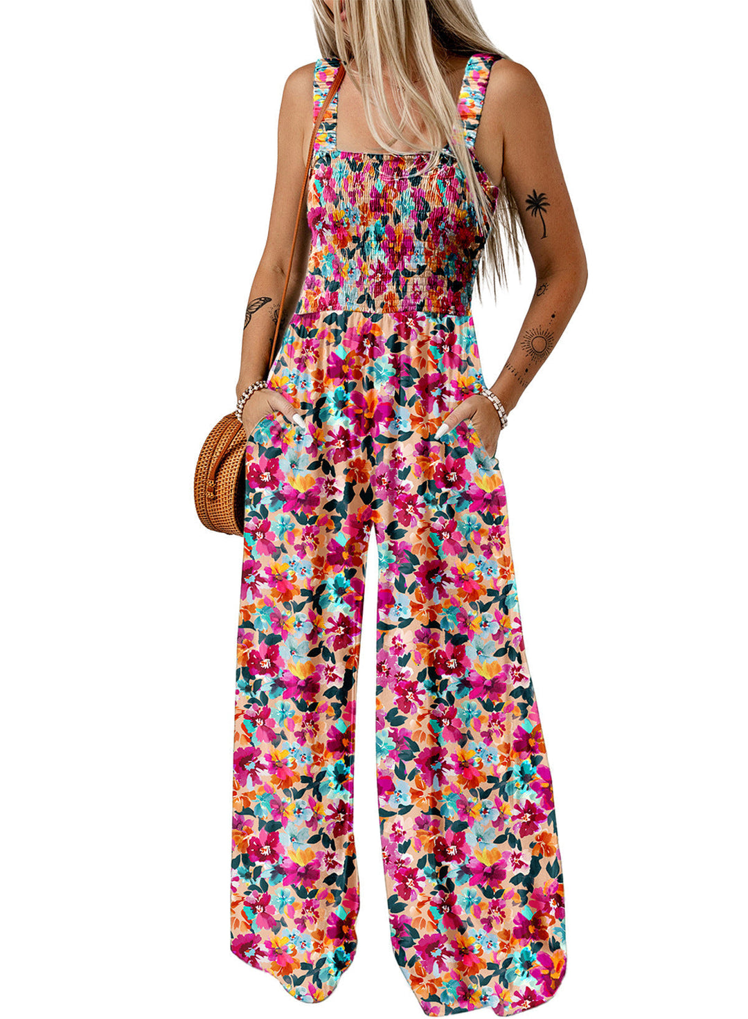 Vibrant floral wide-leg jumpsuit for women, perfect for spring/summer casual or vacation wear.