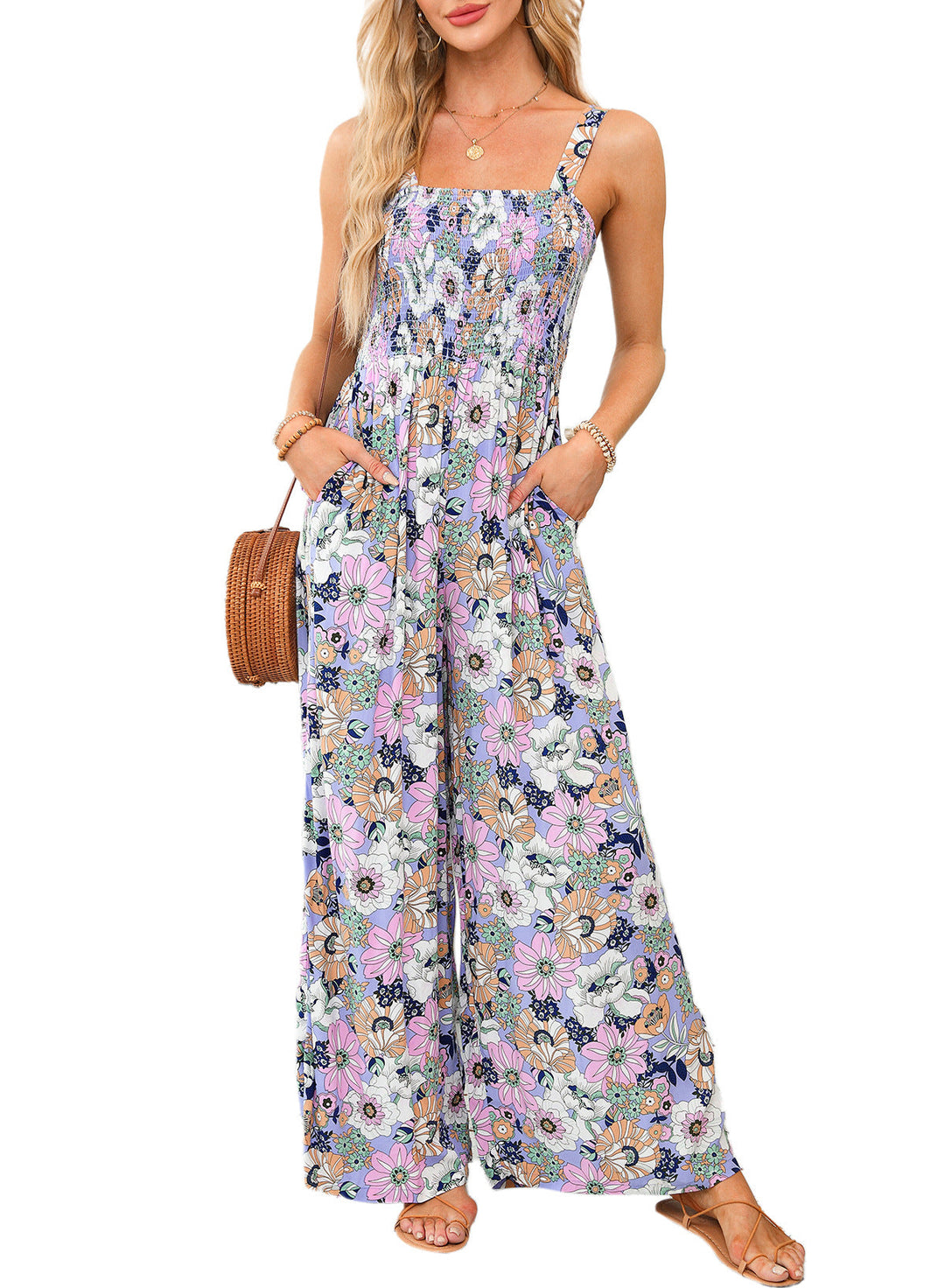 Elegant women's floral wide-leg jumpsuit, comfortable and stylish for summer parties & bohemian looks.