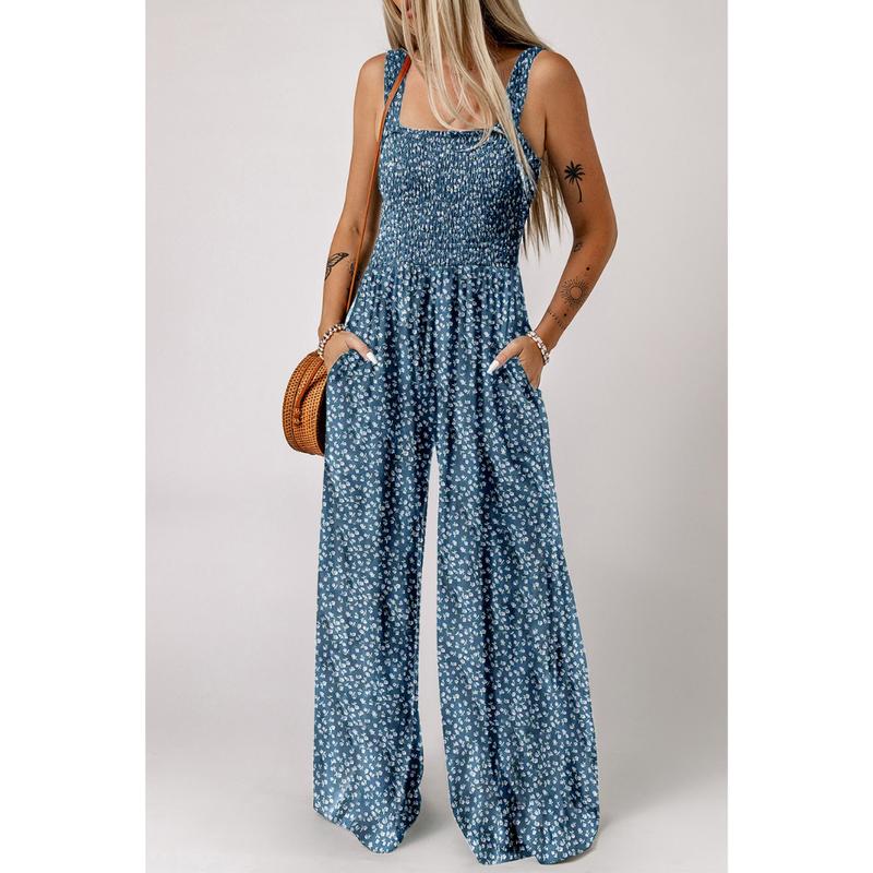 Women's vibrant floral wide-leg jumpsuit. Comfortable and elegant for spring/summer casual & party wear.