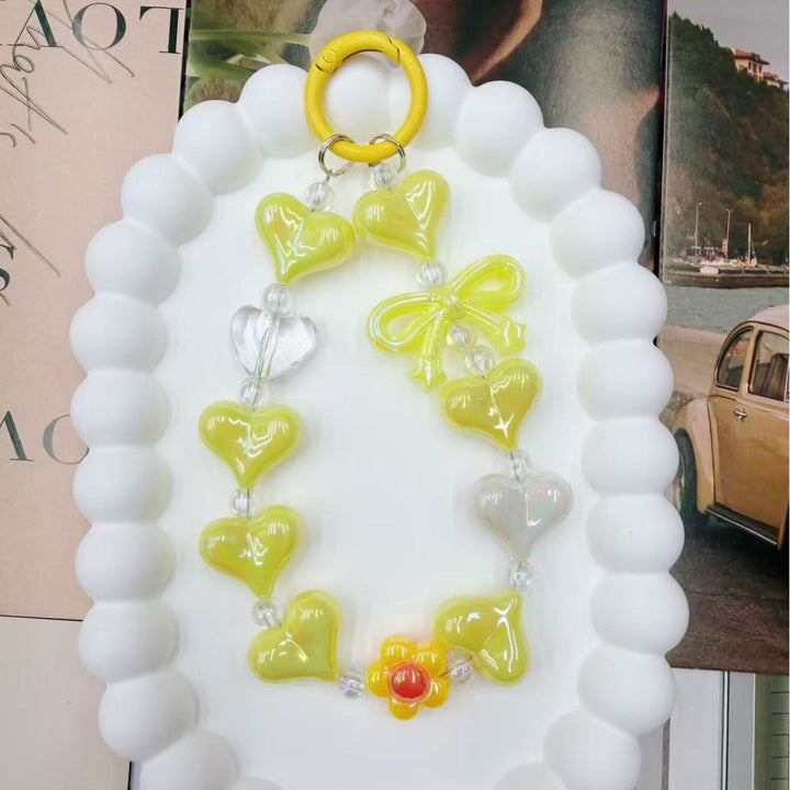 Premium iridescent heart charm keychain, multi-color and vibrant. A chic women's accessory or thoughtful gift.