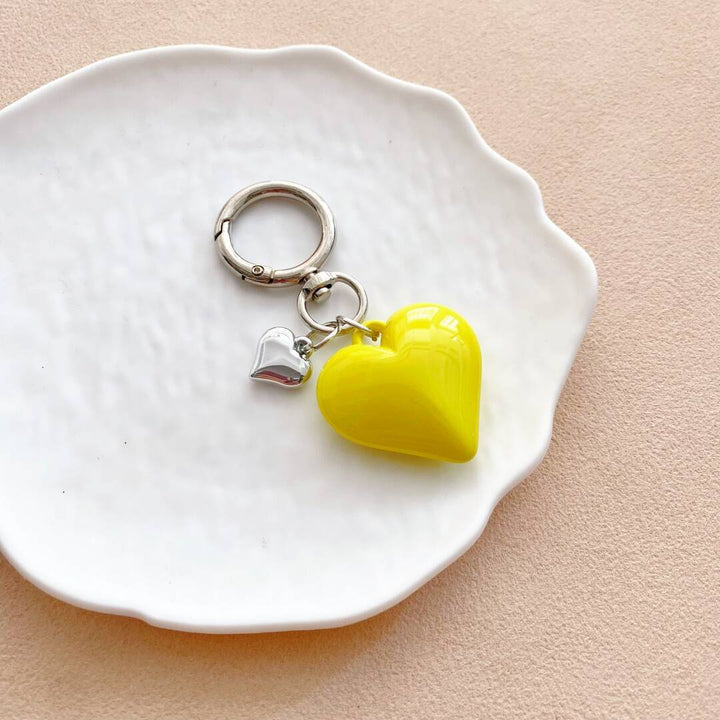 Modern heart charm keychain, a fashionable bag accessory and gift idea.
