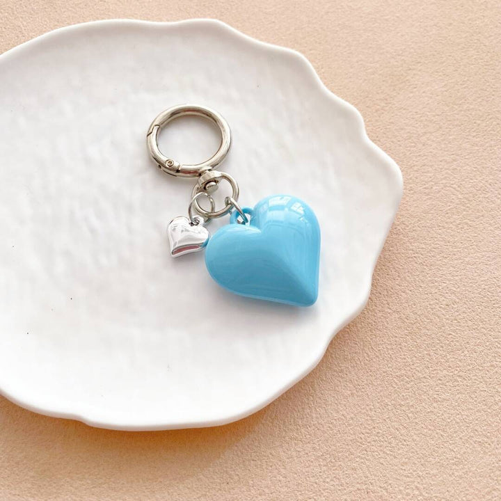 Colorful love heart key holder, a trendy fashion accessory for purses.