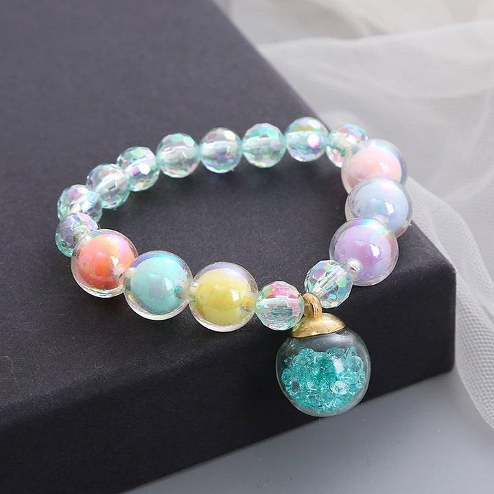 Vibrant multi-color glass bead stretch bracelet for women. Elastic beaded jewelry for everyday wear.