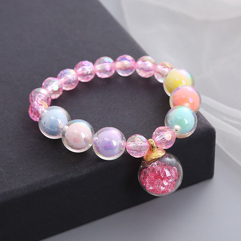 Women's vibrant glass bead bracelet, stretch fit. Multi-color elastic beaded jewelry for fashion.