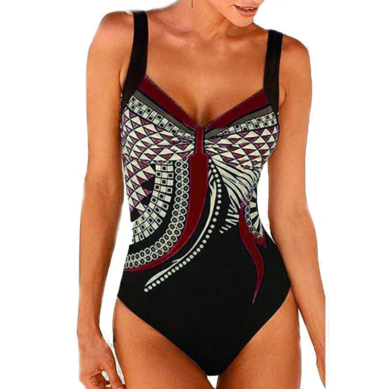 Women's tummy control swimsuit in a vibrant print, designed for a flattering silhouette & ultimate comfort.