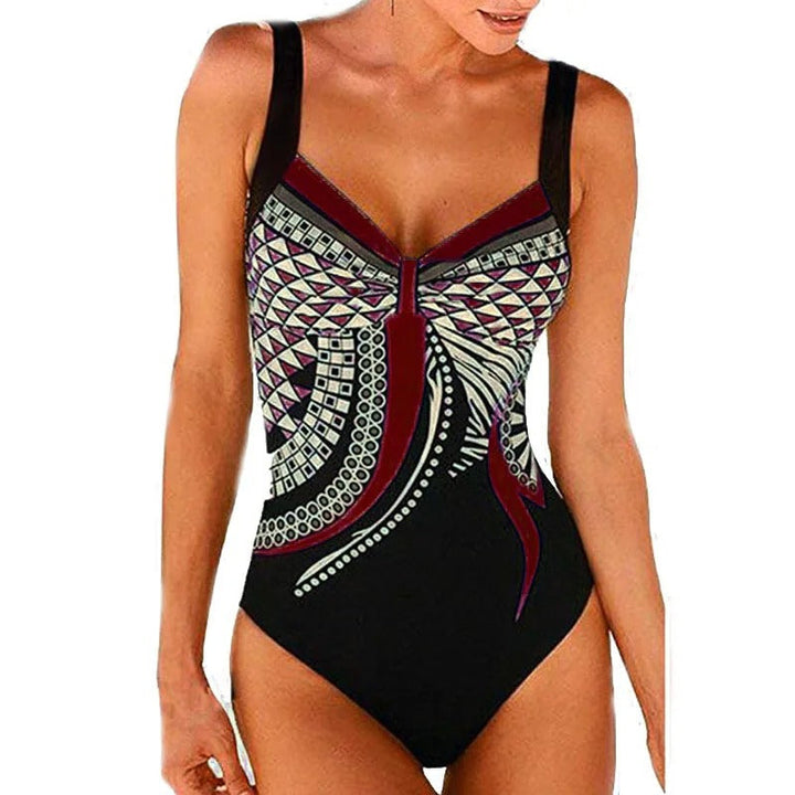Women's tummy control swimsuit in a vibrant print, designed for a flattering silhouette & ultimate comfort.