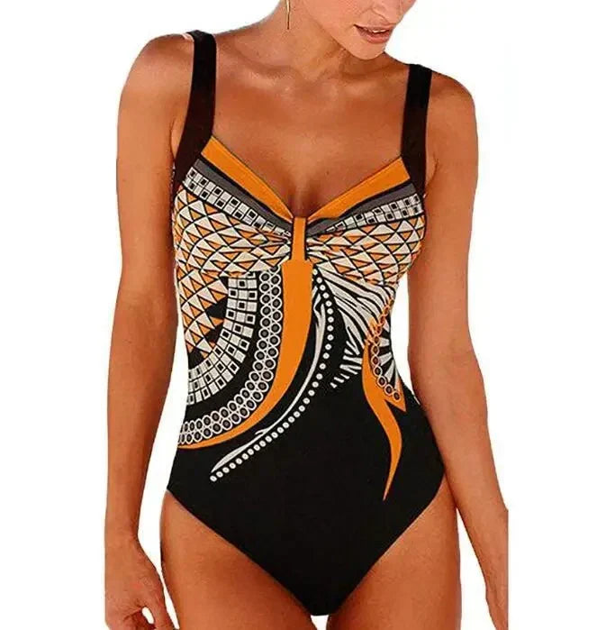 Confident women's printed beachwear, providing tummy control for a sleek look. A summer essential swimsuit.