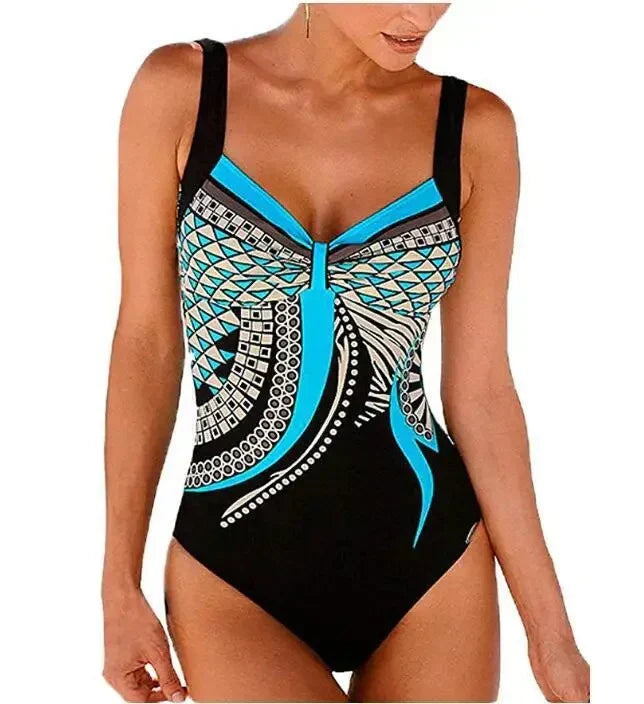 Resort-ready women's printed swimsuit with tummy control and adjustable straps for a perfect summer fit.
