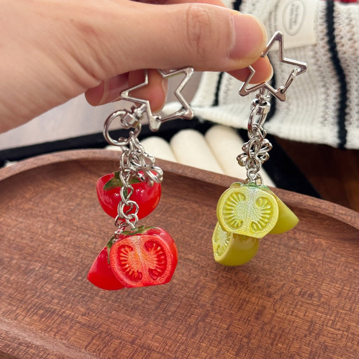 Charming tomato fruit keychain accessory, ideal for personalizing bags, backpacks, or keyrings. Unique gift idea.