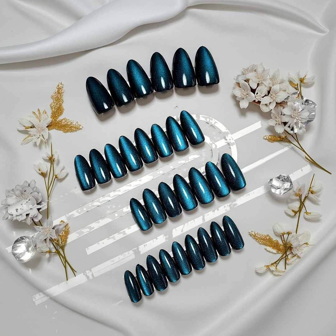 Woman's hand with high-gloss vibrant teal gel polish manicure, perfect for long-lasting nail art.