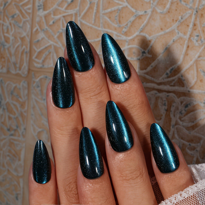 Close-up of a sleek bottle of vibrant teal gel nail polish, essential for women's beauty & nail care.