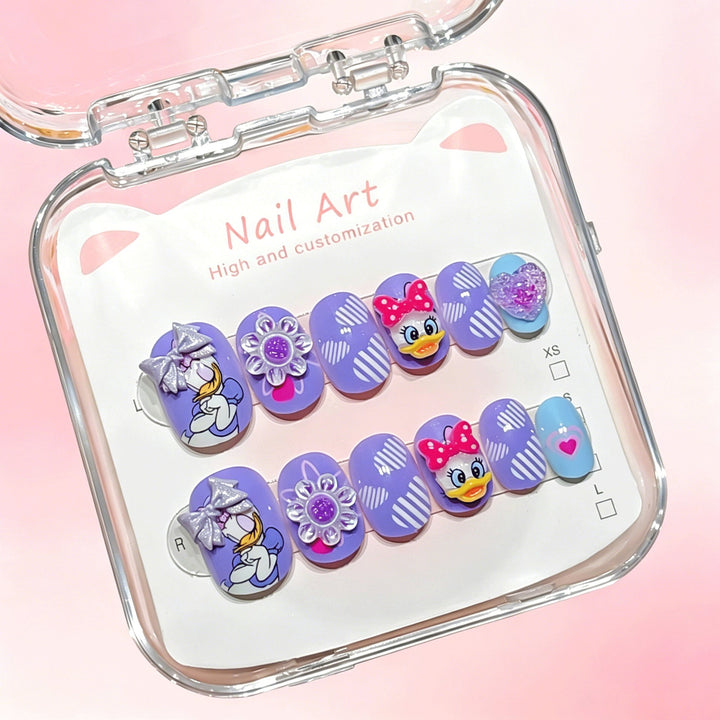 Display of various cartoon-themed press-on nails, ready to transform your look with ease.