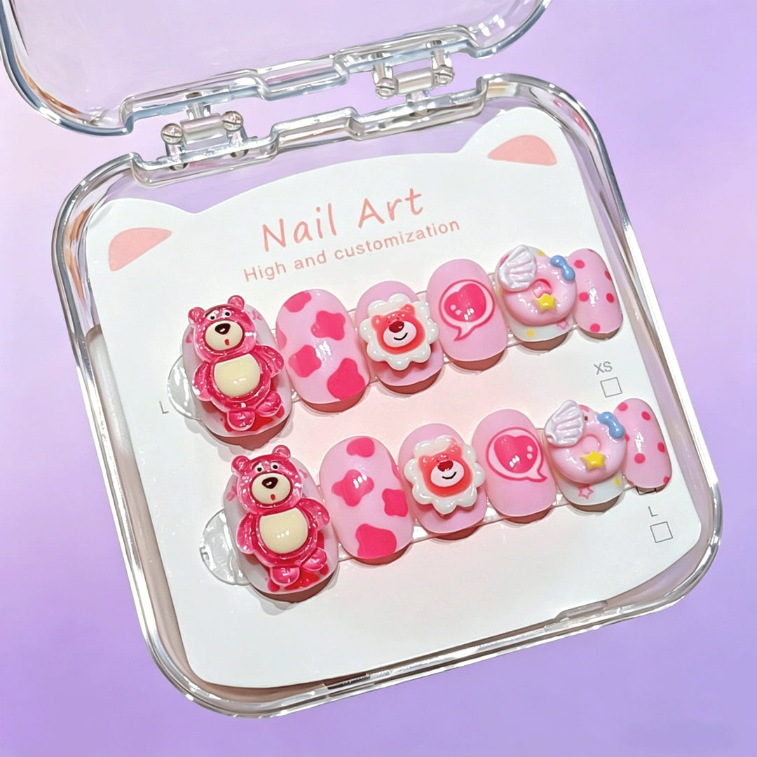 Unisex cartoon press-on nail kit with whimsical designs, for creative and decorative nail art.