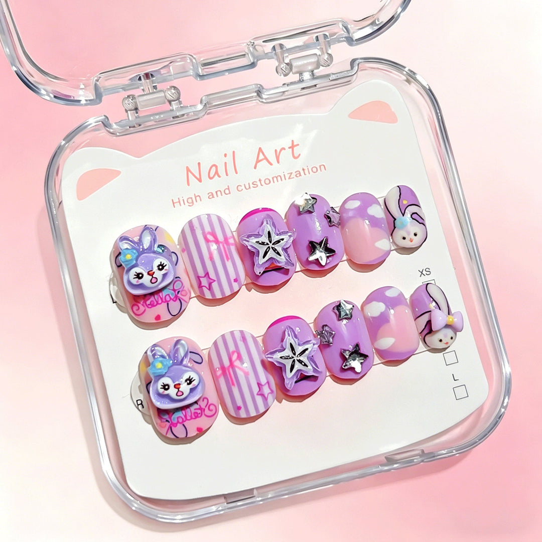 Close-up of a diverse range of cartoon press-on nails, highlighting vibrant colors & patterns.