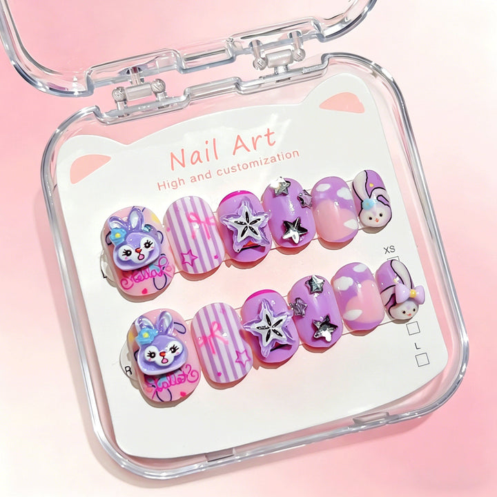 Close-up of a diverse range of cartoon press-on nails, highlighting vibrant colors & patterns.