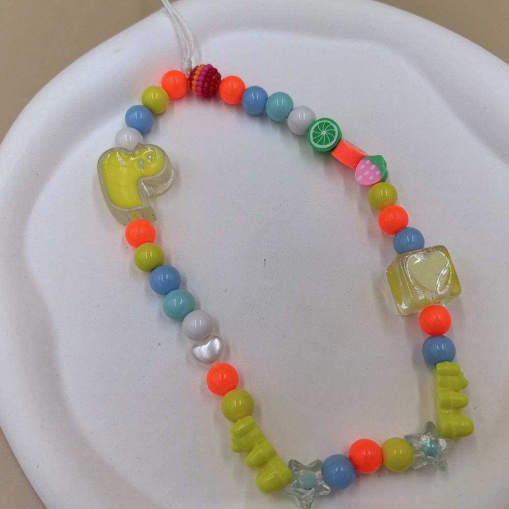 Detailed colorful beaded necklace with assorted charms, a unisex statement piece for a vibrant look.