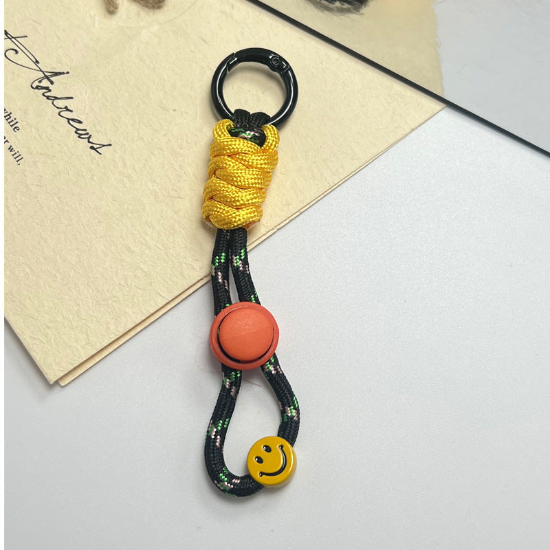 Modern unisex keychain holder in a gift box, a vibrant & functional accessory for stylish key organization.