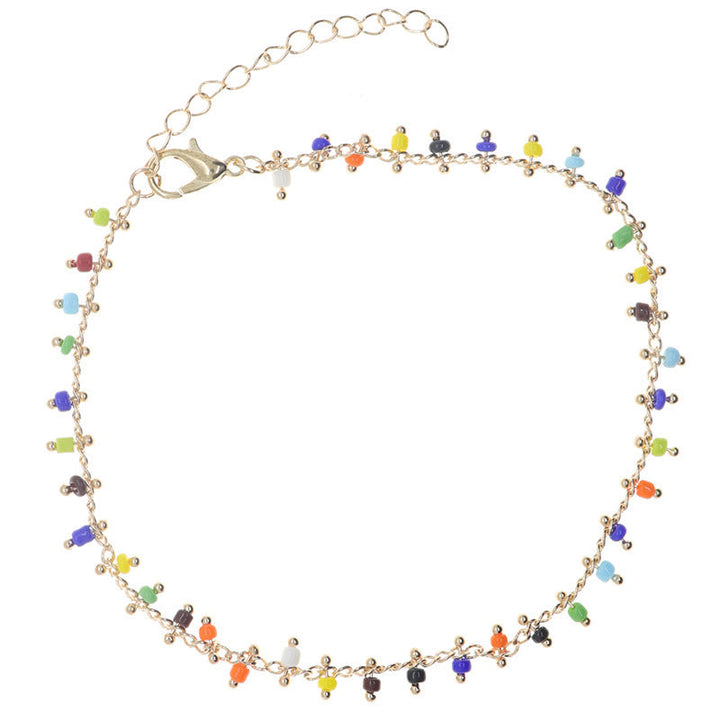 Boho chic women's beaded tassel anklet, featuring vibrant colors, delicate beads, and an adjustable fit for summer style.