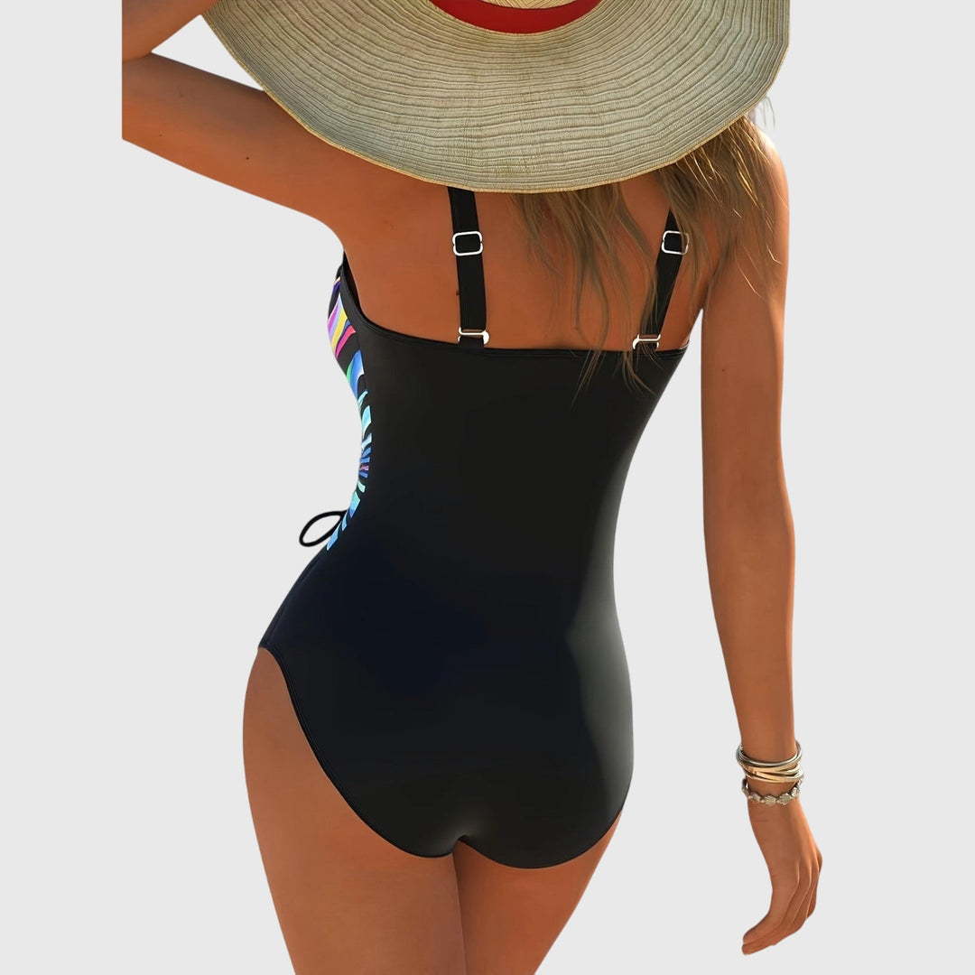 Flattering high elasticity women's swimsuit featuring a vibrant multicolour cross-front design for summer swimwear.