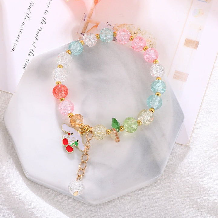 Handcrafted women's elastic bracelet made with vibrant, colorful glass beads. Unique beaded fashion accessory.