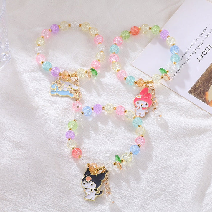 Playful women's charm bracelet featuring an array of colorful glass beads. A vibrant, unique style accessory.