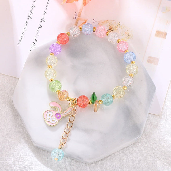 Women's charm bracelet with colorful glass beads, an elastic and vibrant fashion accessory for unique style.