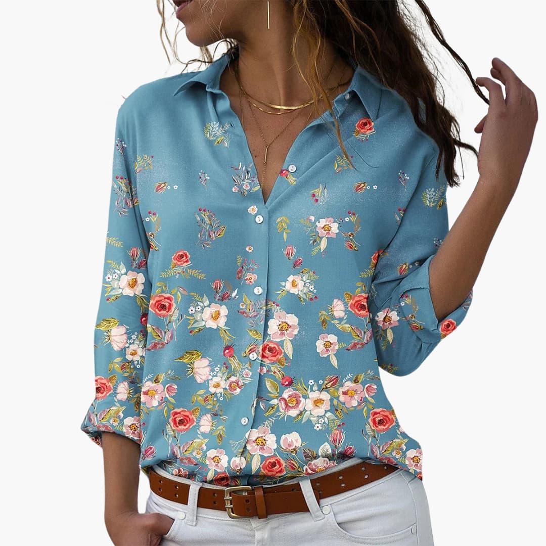 Vibrant women's floral summer top with a relaxed fit, perfect for casual spring fashion.