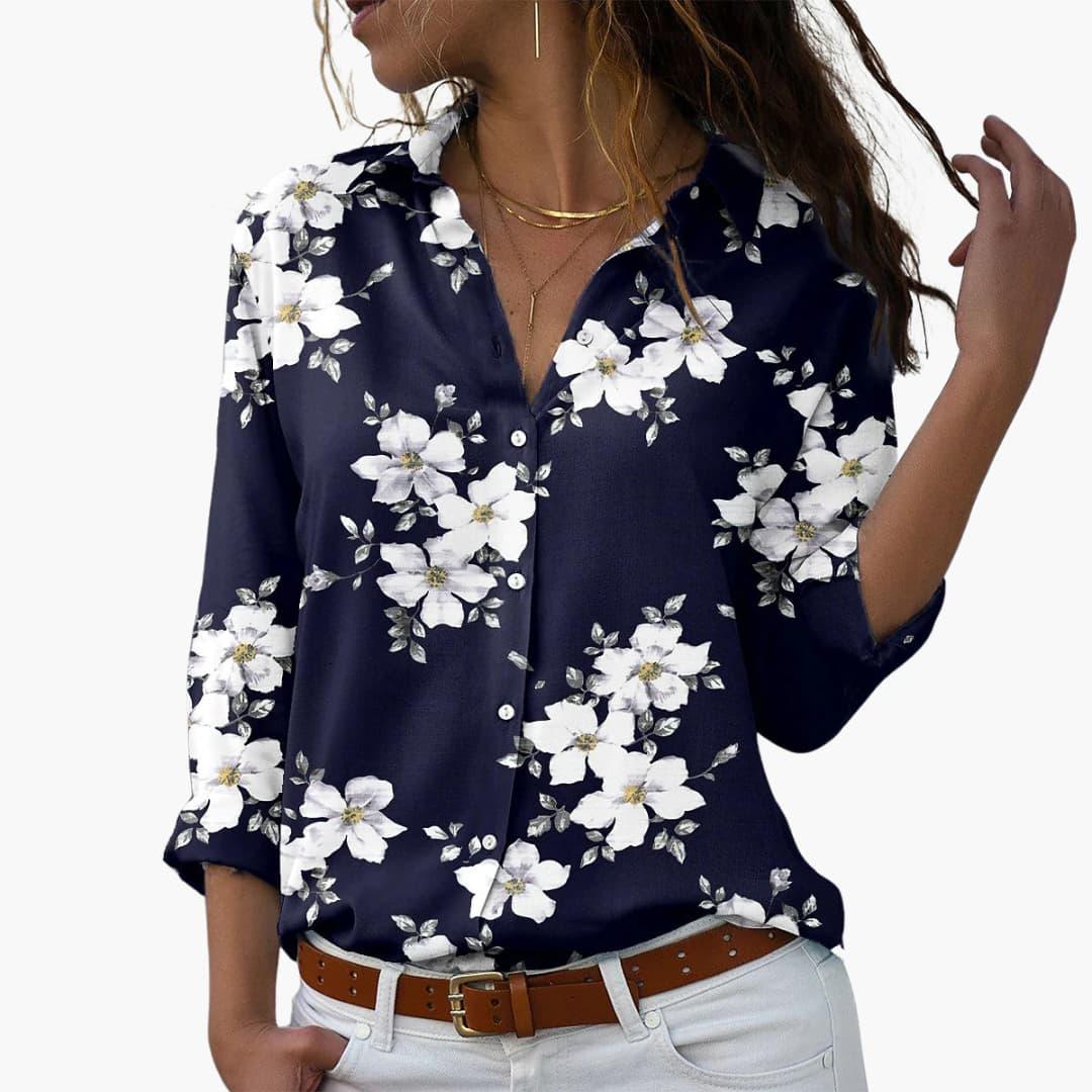 Comfortable relaxed fit women's short sleeve floral blouse, ideal for trendy summer casual wear.