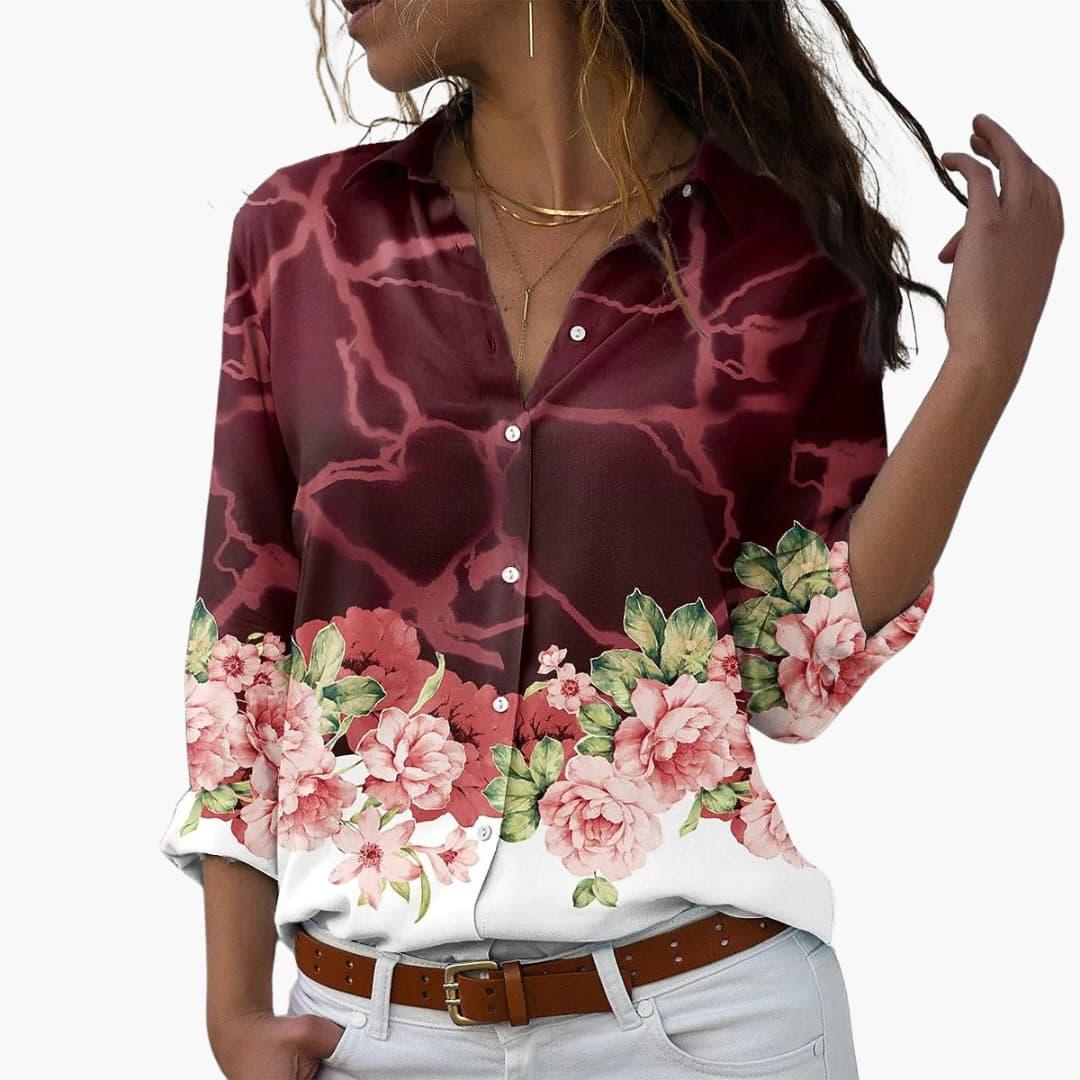 Relaxed fit women's summer floral blouse with a vibrant print, great for casual spring/summer outfits.