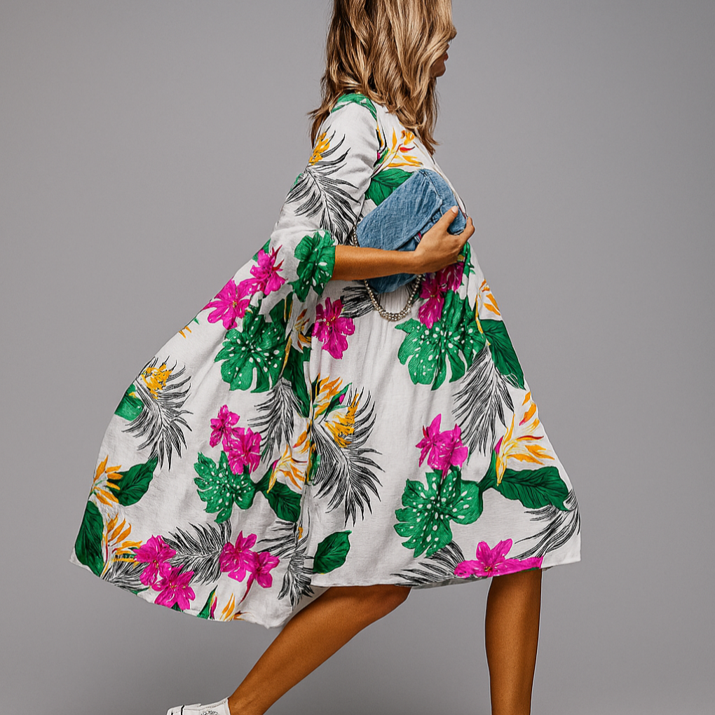Elegant women's A-line midi dress with bold oversized floral print & stylish puff sleeves. Perfect statement summer dress.