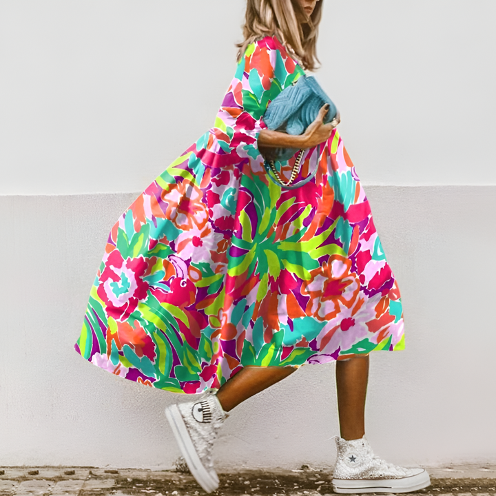 Stylish women's oversized floral print midi dress. A vibrant, comfortable pull-on A-line dress for spring & summer.