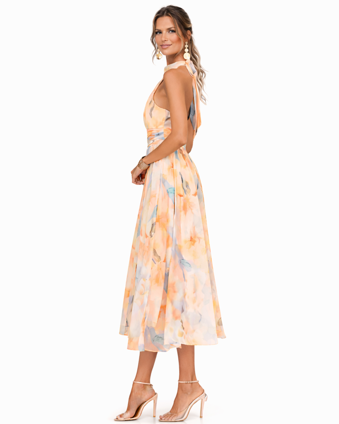 Flowing women's midi dress featuring artistic watercolor print & flattering halter neck, great for events.
