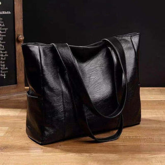 Reddish-brown vintage leather women's shoulder bag, a classic everyday crossbody or handbag for women.