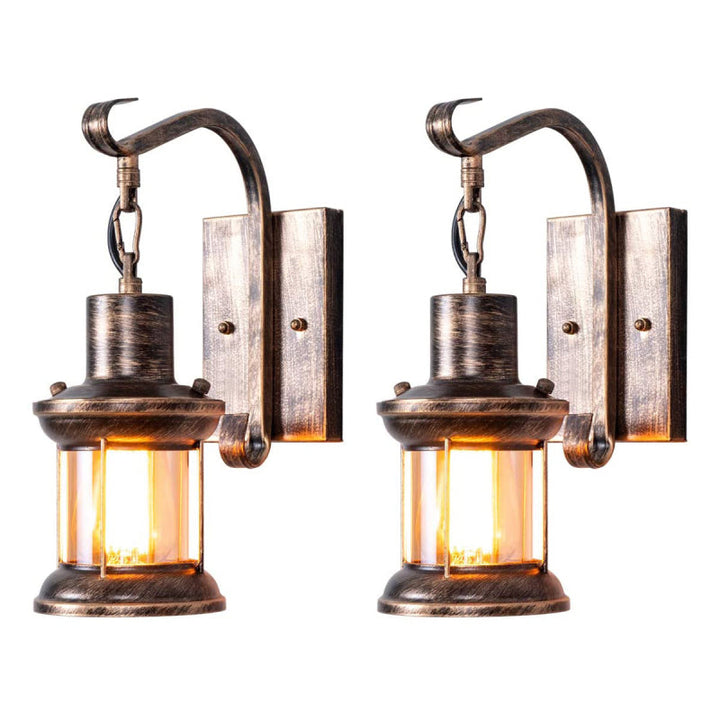 Rustic industrial metal wall sconce, provides cozy vintage illumination.