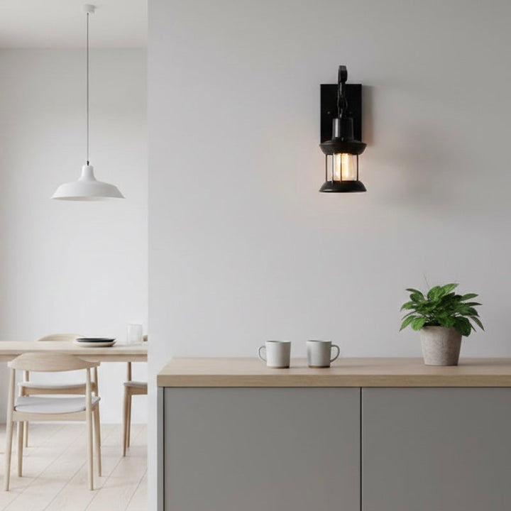 Classic industrial metal wall lamp with vintage charm for indoor lighting.