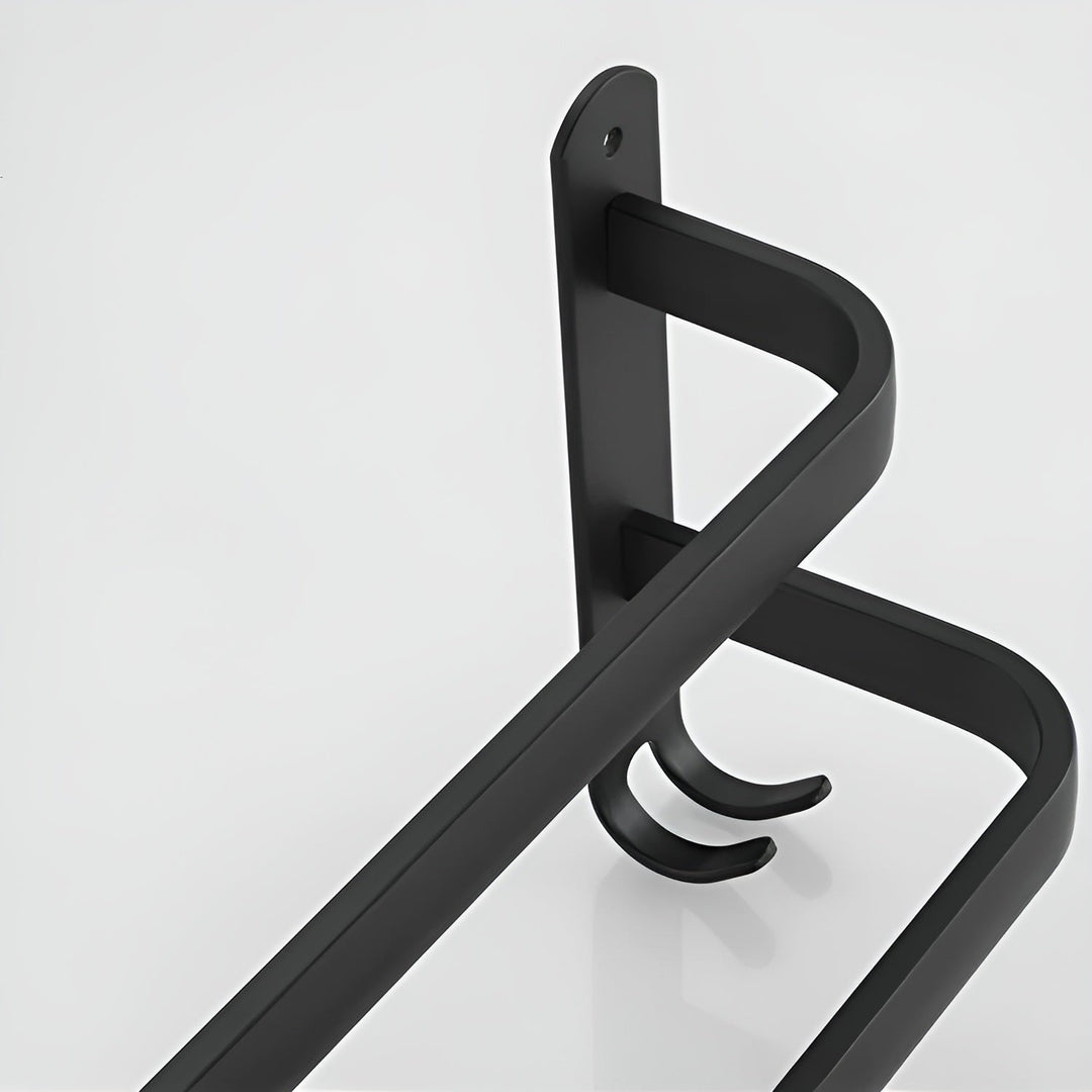 Detail of rust-resistant stainless steel wall-mounted towel rack bars, showing sturdy, space-saving bathroom storage.