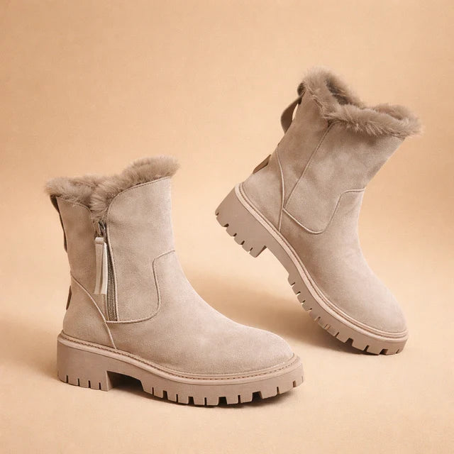 Warm & cozy women's ankle boots for winter. Stylish, comfortable design with non-slip soles for cold weather fashion.
