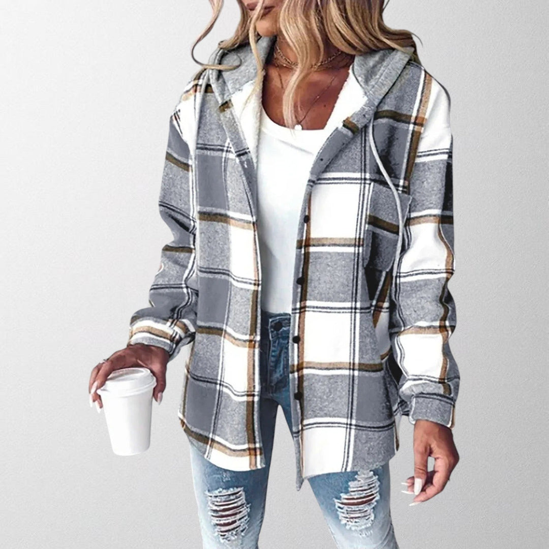 Warm women's hooded jacket in a stylish design, perfect for everyday comfort during fall and winter. Features long sleeves.