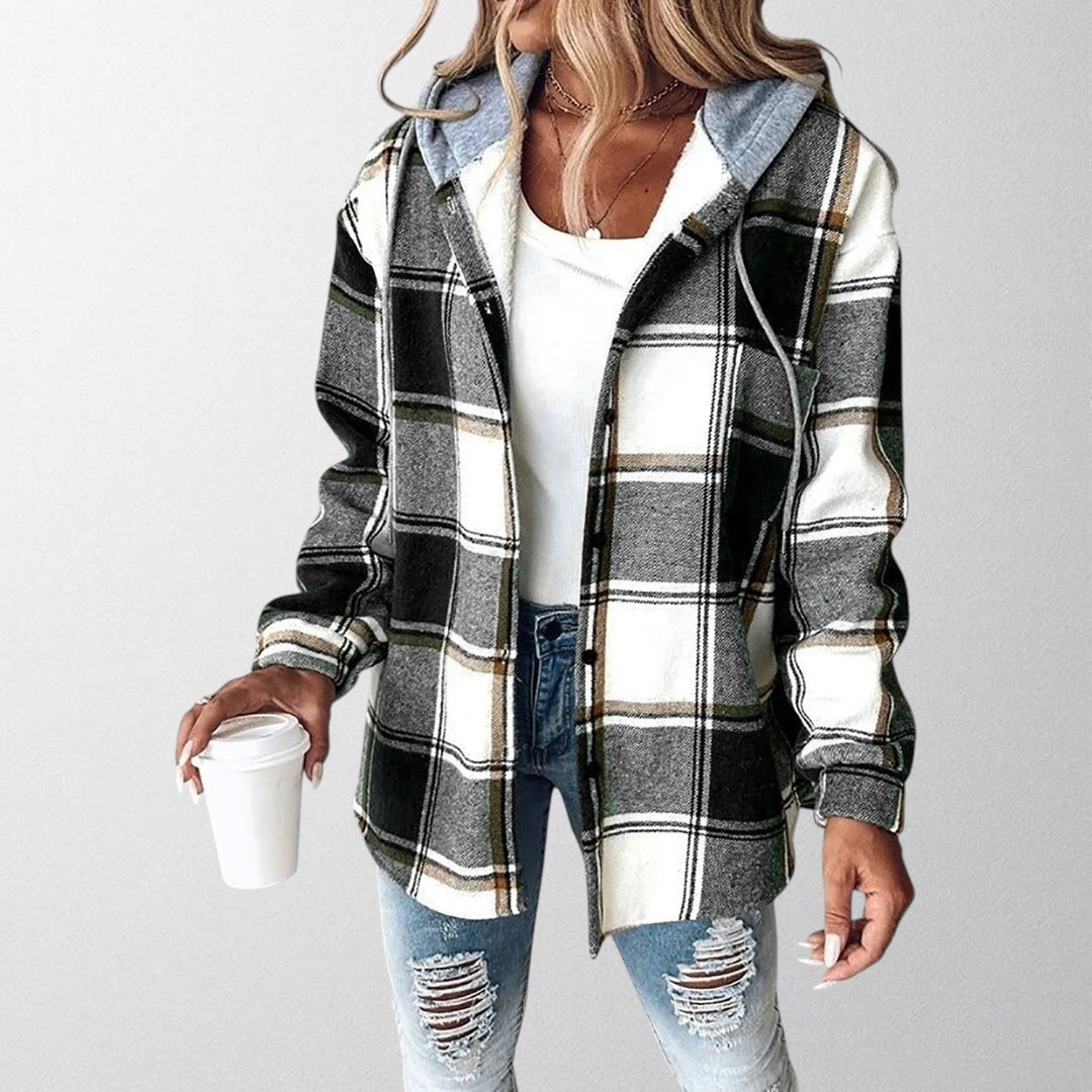 Woman wearing a stylish & warm hooded jacket, perfect casual outerwear for fall. Ideal for everyday comfort and layering.