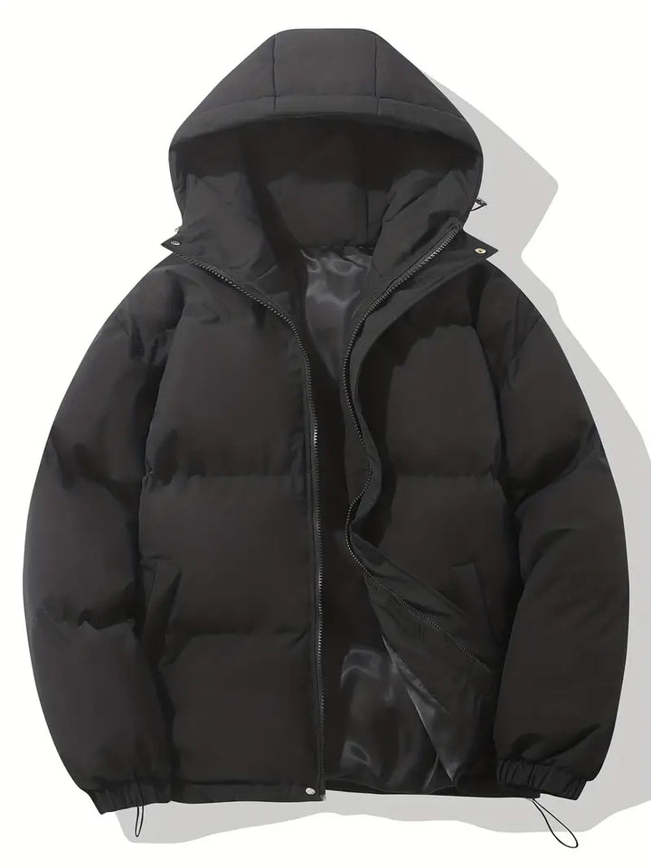 Stylish women's hooded puffer jacket with a cozy quilted design. Ideal warm outerwear for winter.