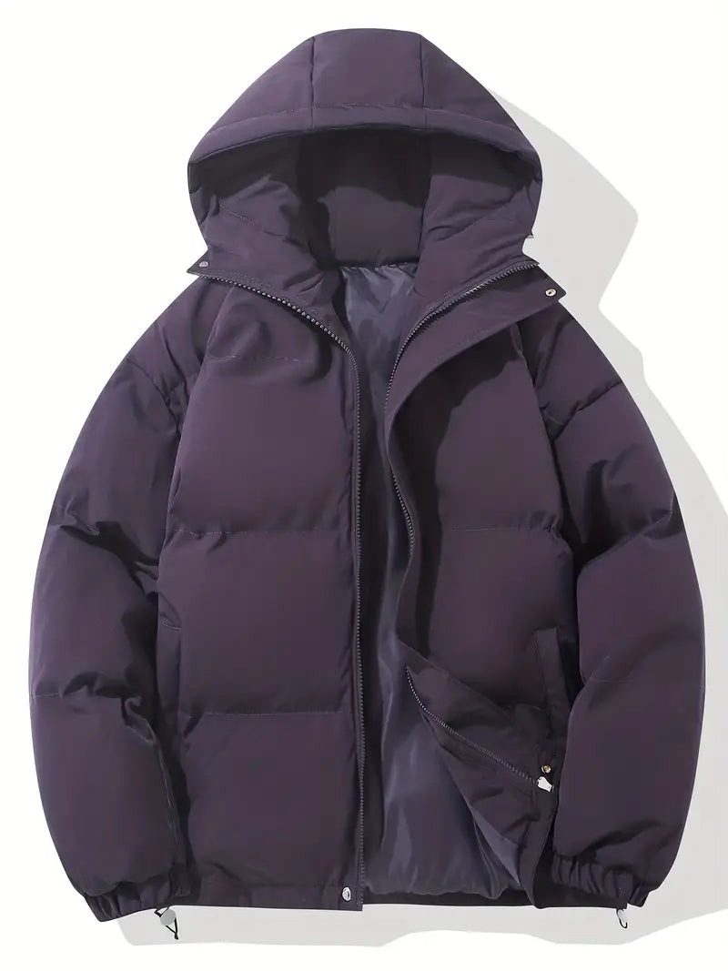 Fashionable women's winter coat, a warm quilted puffer jacket with a functional hood. Essential outerwear.